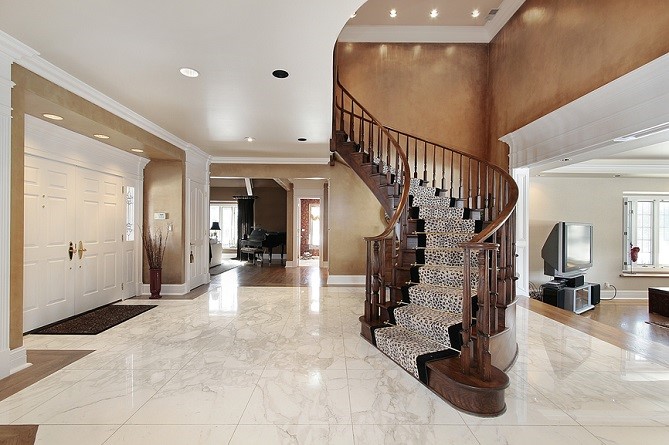 Marble floor with protective entryway rug